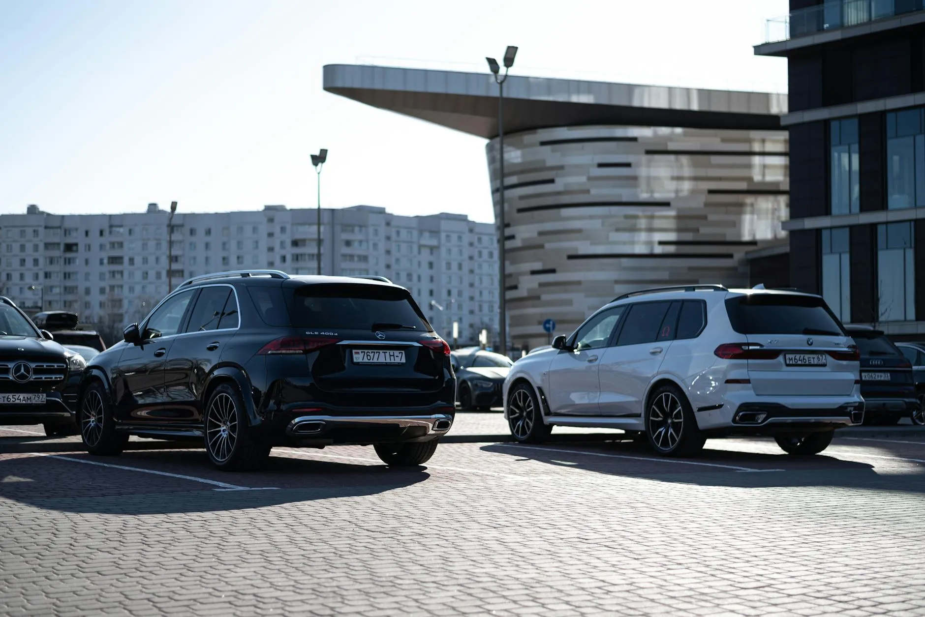 Range Rover GLE Cayenne and X5 luxury SUVs on Sheikh Zayed Road Dubai 2026